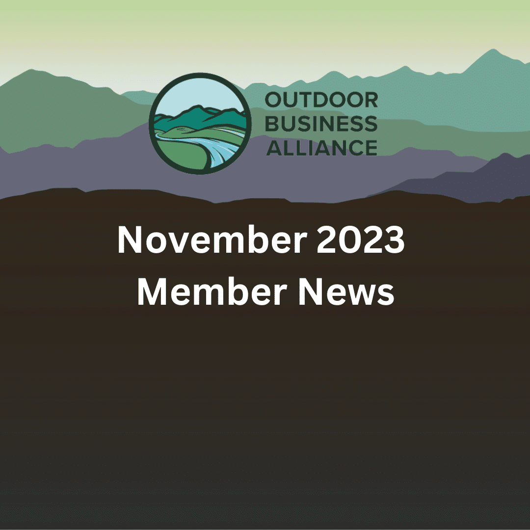 Outdoor Business Alliance November Member News overlaid a mountain scene of cool colors